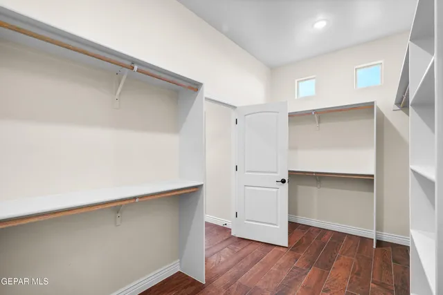 a bathroom with a tub and shower