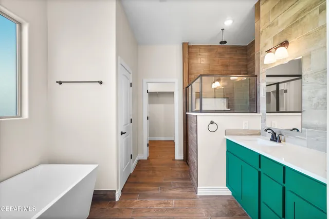 a view of gallery with wooden floor