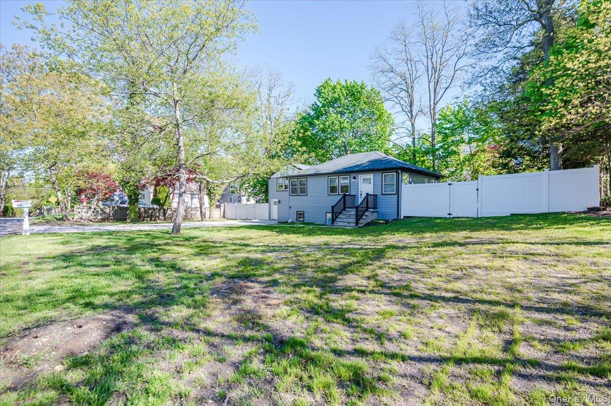 55 Hickory Road Rocky Point, NY 11778 - Photo 25 of 25 a house view with a garden space