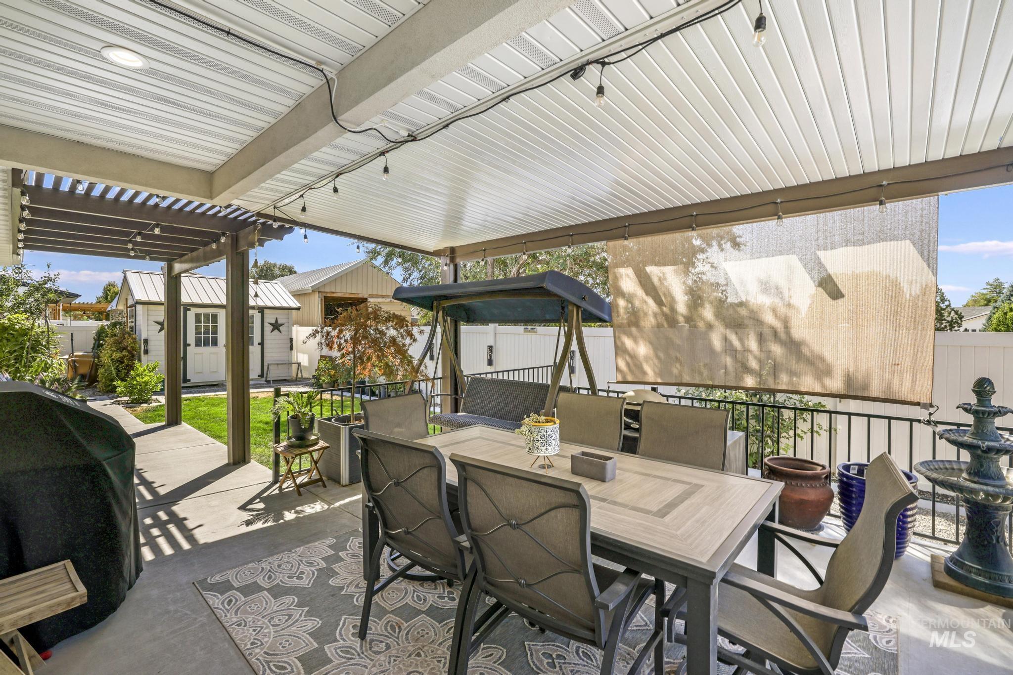 1384 Jump Street Twin Falls, ID 83301 - Photo 25 of 37 View of patio featuring a grill and outdoor dining area