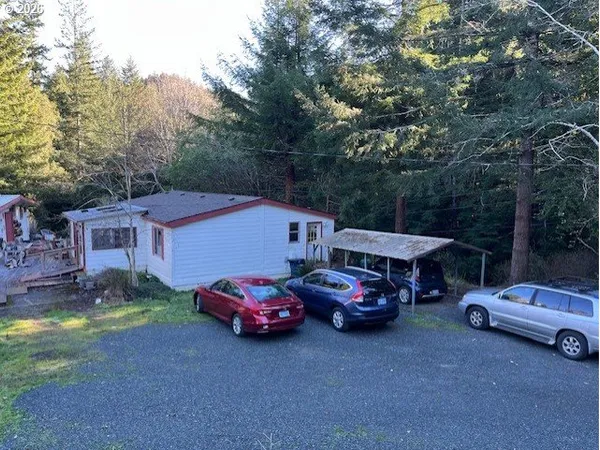a car parked in front of a house