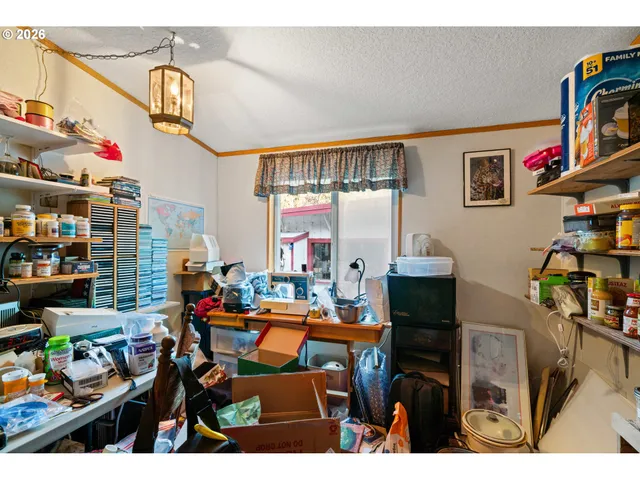 a picture of a room with lots of stuff and toys