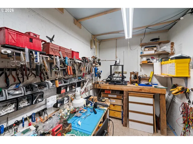 a view of living room filled with furniture and floor to ceiling windows