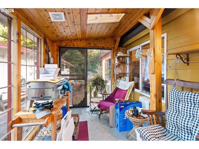 a sitting area with furniture and outdoor space