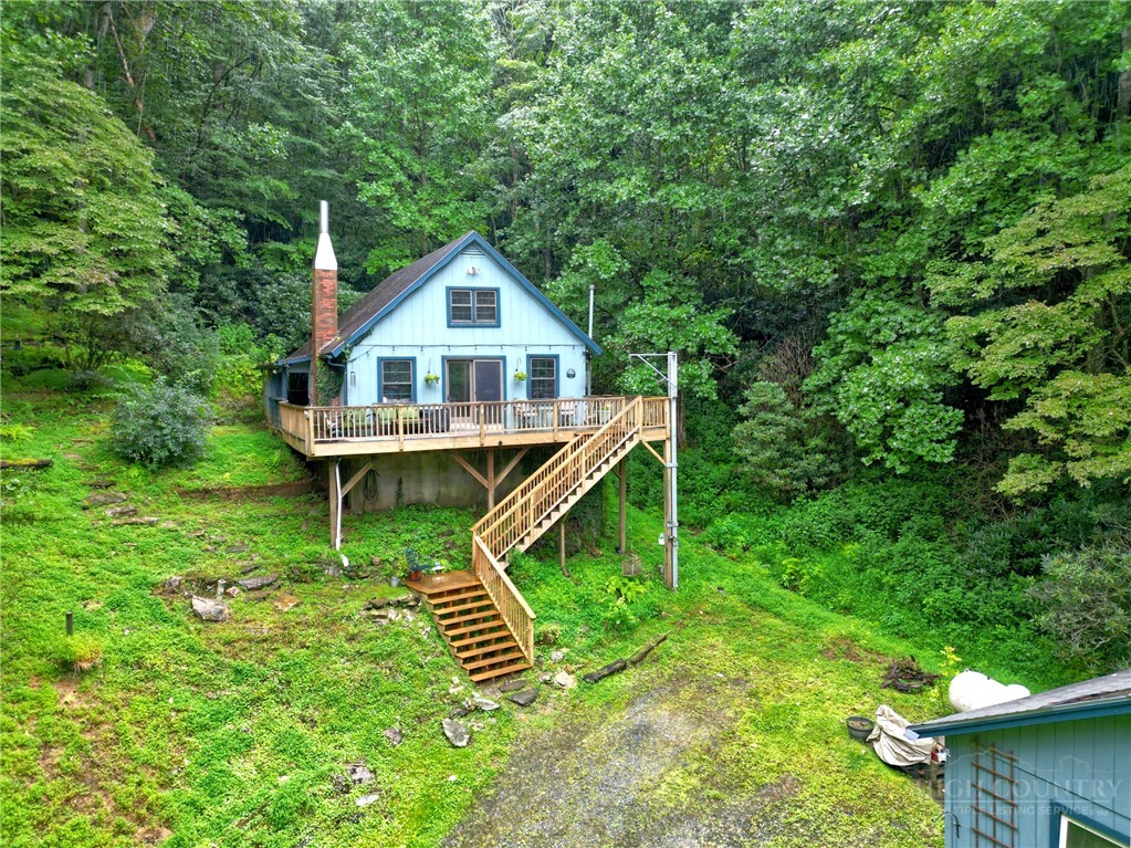 9440 Blackberry Road Lenoir, NC 28645 - Photo 1 of 30 a front view of a house with garden
