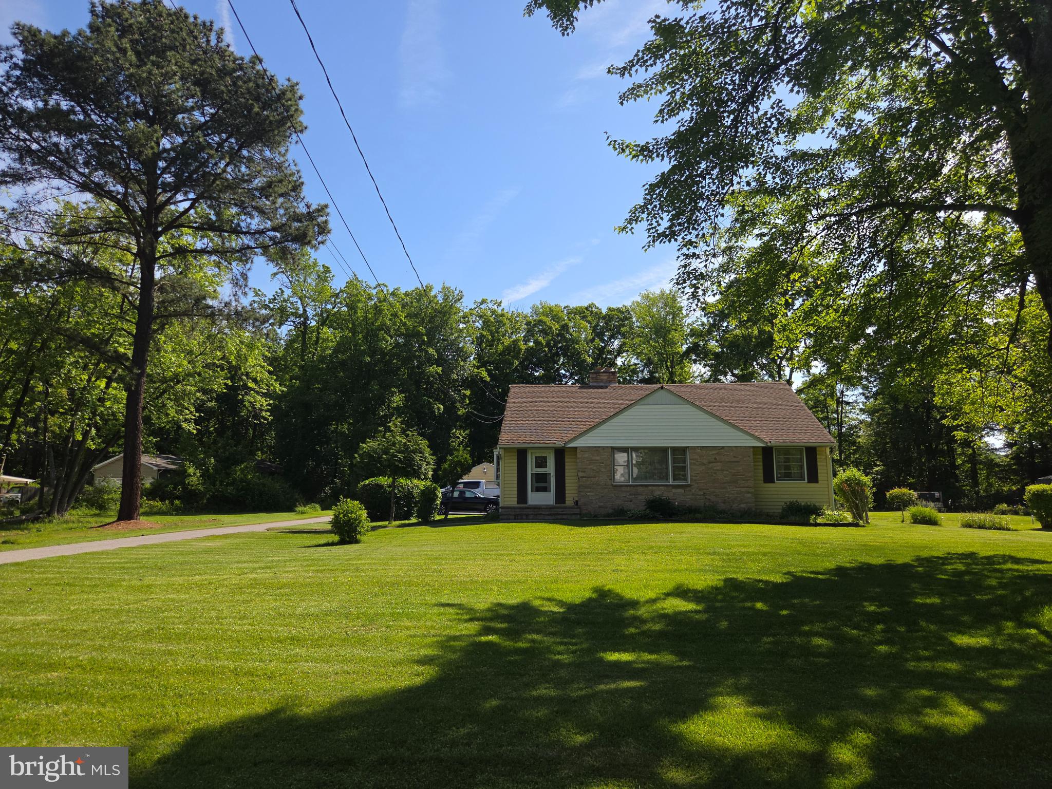 305 Bowleys Quarters Road Middle River, MD 21220 - Photo 2 of 16 a front view of a house with yard and green space