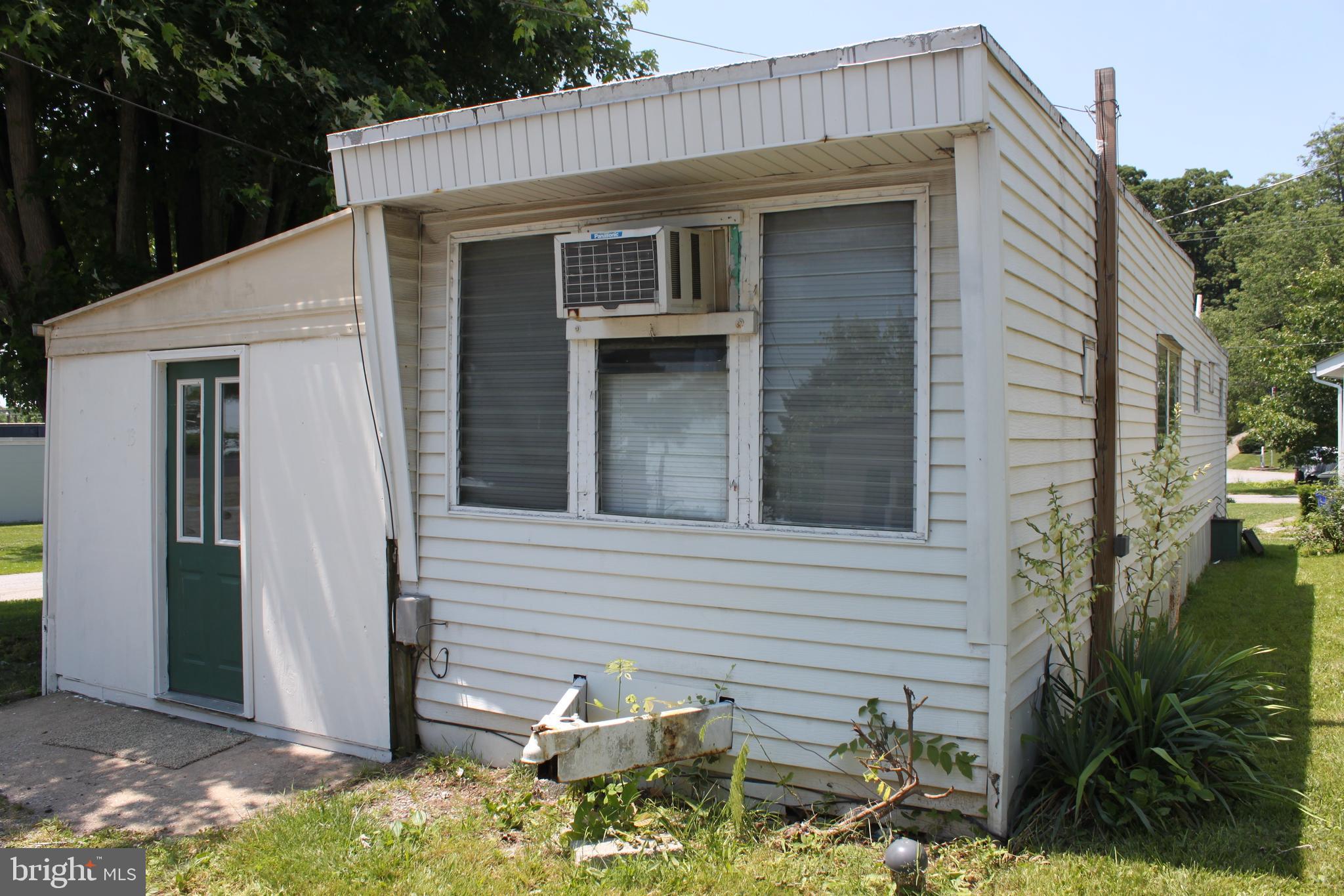 3230 Oakland Road, Unit 13 Dover, PA 17315 - Photo 1 of 7 a view of backyard of the house