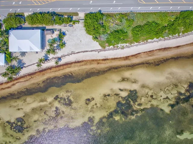 a bedroom with a bed and a cabinets