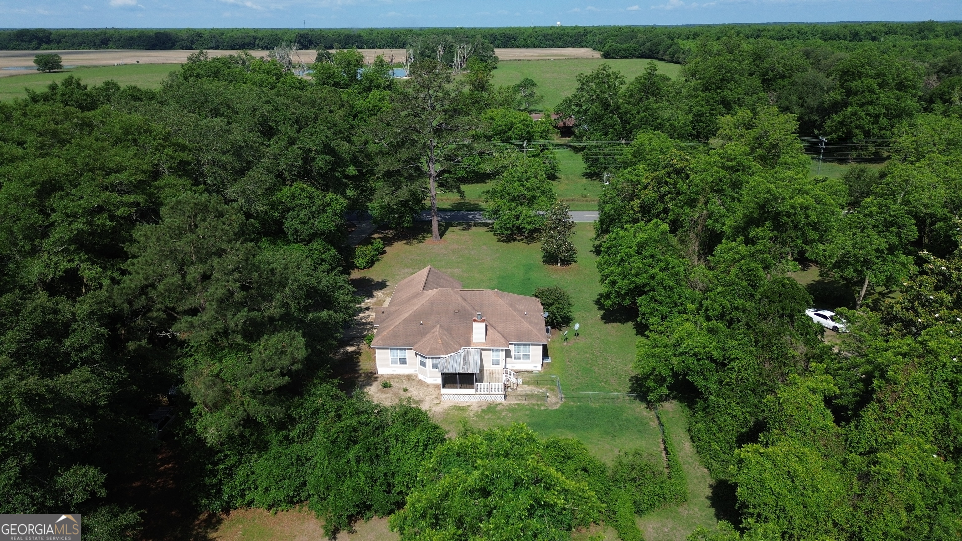 959 Lovers Lane Road Leesburg, GA 31763 - Photo 18 of 19 an aerial view of a house with a yard and lake view
