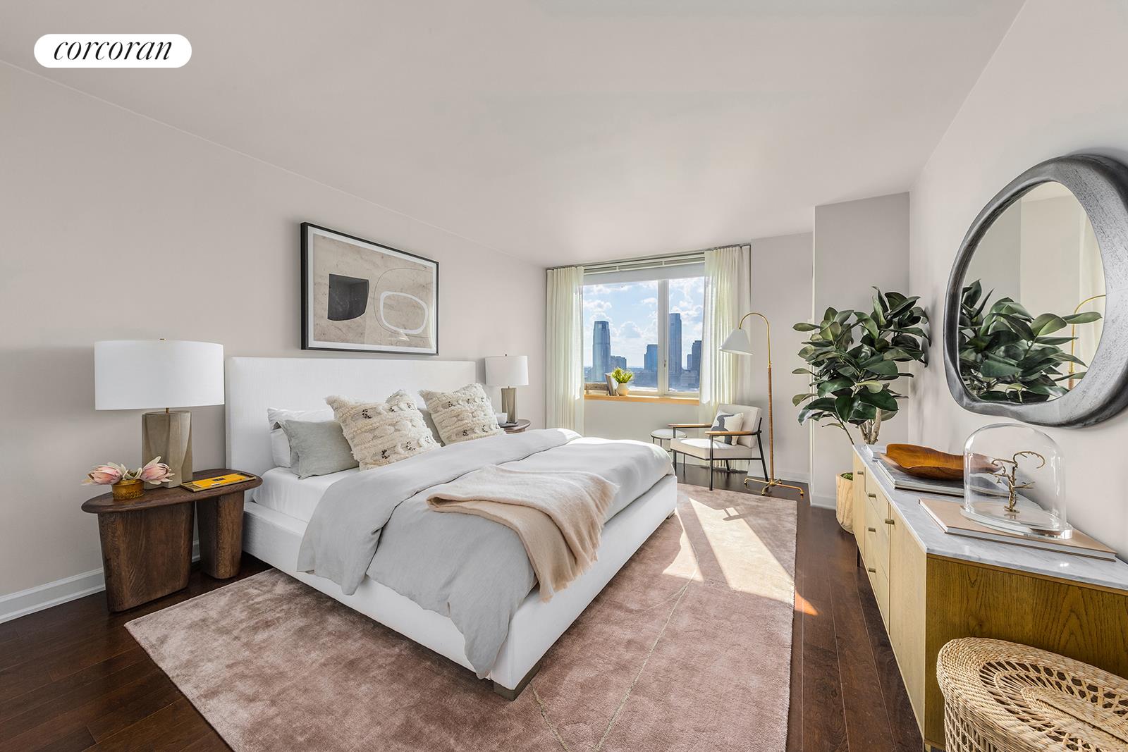 20 River Terrace, Unit 26B Manhattan, NY 10282 - Photo 5 of 25 a bedroom with bed and a couch