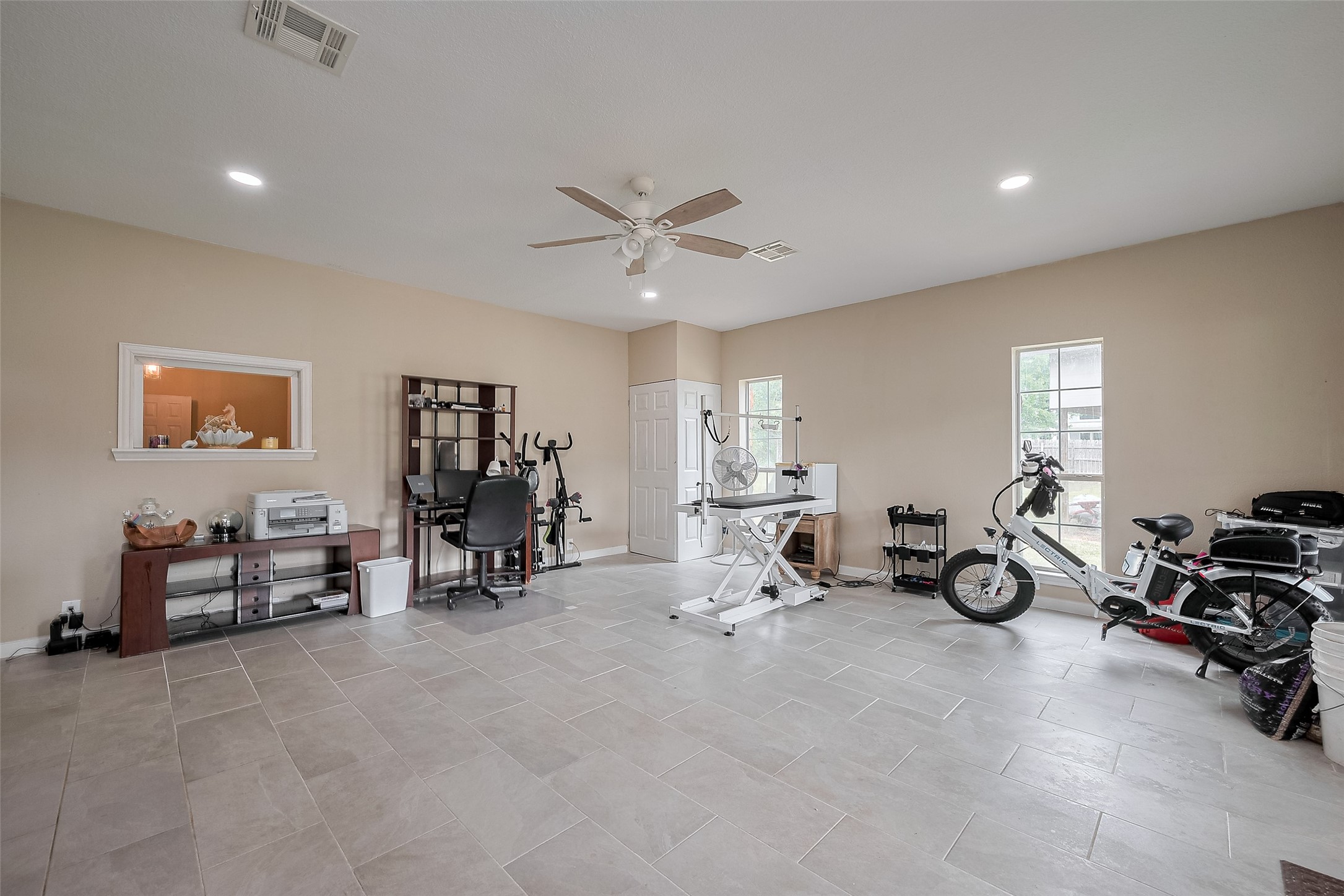2499 Southline Road Conroe, TX 77384 - Photo 22 of 48 a view of a room with gym equipment