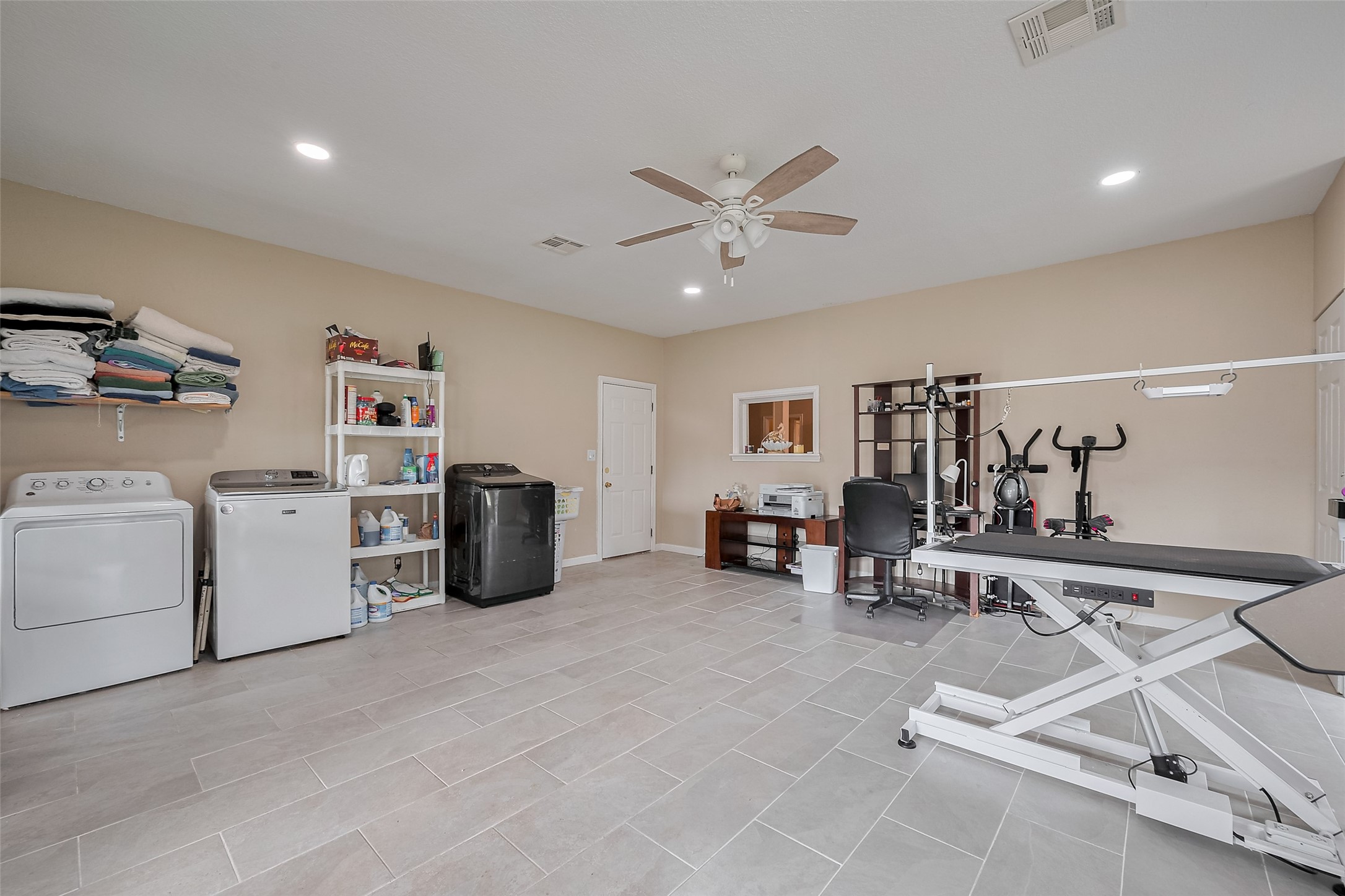 2499 Southline Road Conroe, TX 77384 - Photo 23 of 48 a view of a room with gym equipment