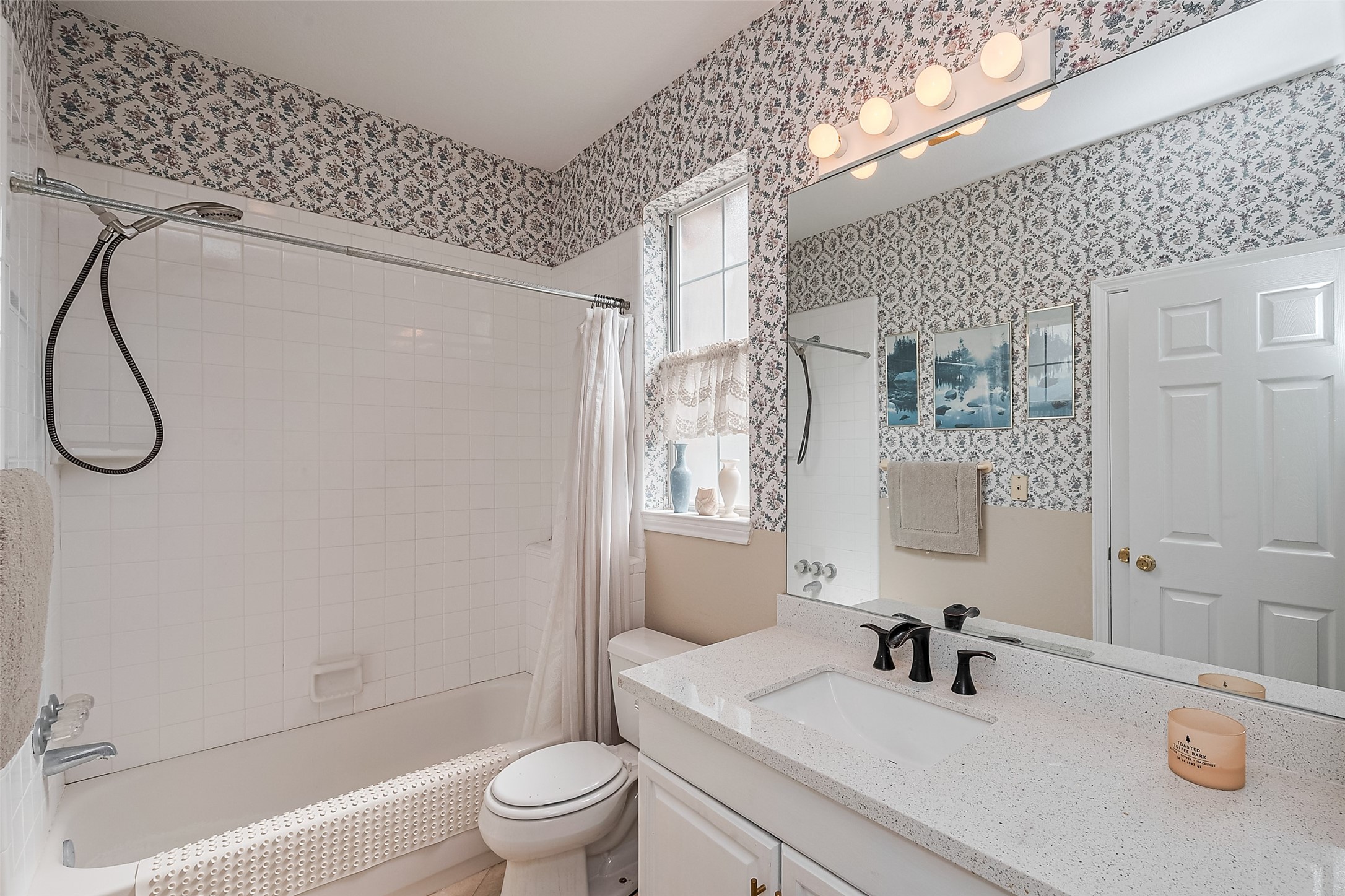 2499 Southline Road Conroe, TX 77384 - Photo 32 of 48 a bathroom with a sink a toilet and shower