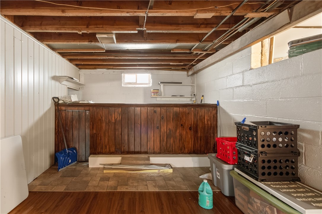 147 Wood Road Greece, NY 14626 - Photo 24 of 26 Partially finished basement w/ bar offers space fo