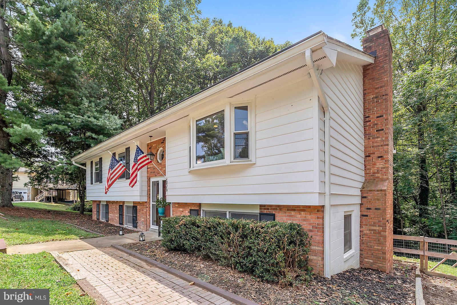636 Hope Road Stafford, VA 22554 - Photo 3 of 43 Brick sidewalk leads to front door