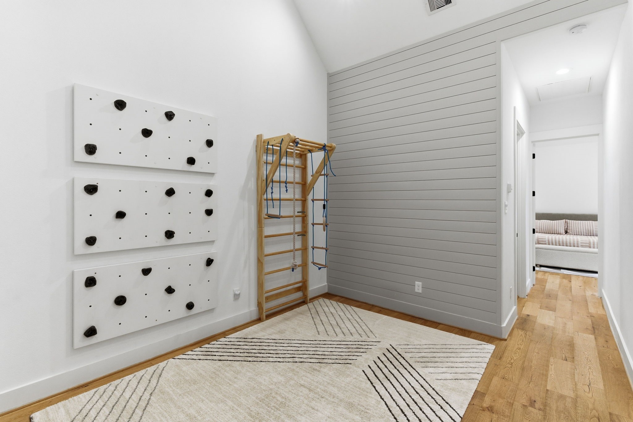 504 Oxford Street Houston, TX 77007 - Photo 24 of 47 The flex-room offers a versatile space that can easily function as a home office, play area, or creative studio. Shiplap detail and tall ceilings give the room character without sacrificing simplicity. It’s a flexible bonus space that adapts to your needs.