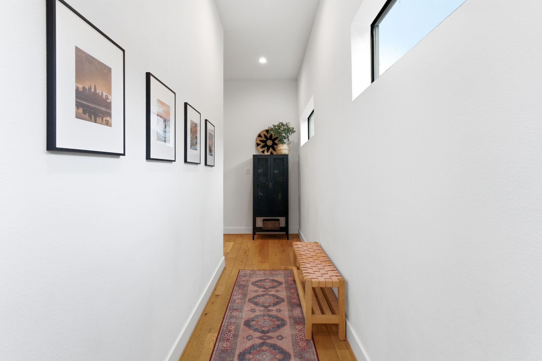 504 Oxford Street Houston, TX 77007 - Photo 3 of 47 Well-appointed entry makes a strong first impression with tall ceilings and warm wood flooring. Natural light draws you toward the main living areas while maintaining a sense of separation. The layout feels open without sacrificing privacy.