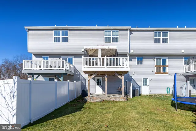 a view of a house with roof deck