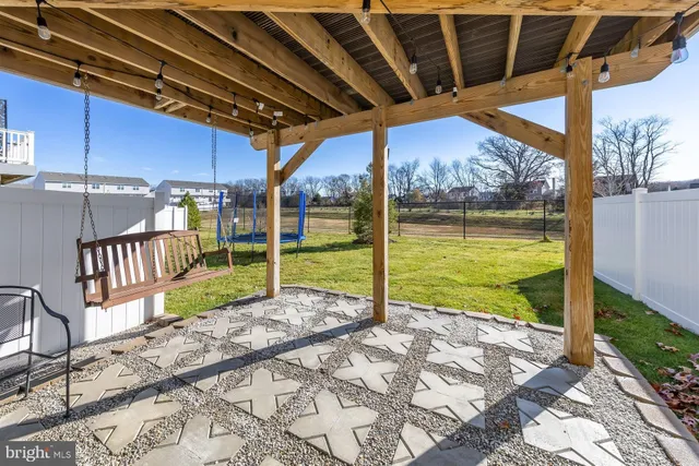 a view of a porch with a backyard