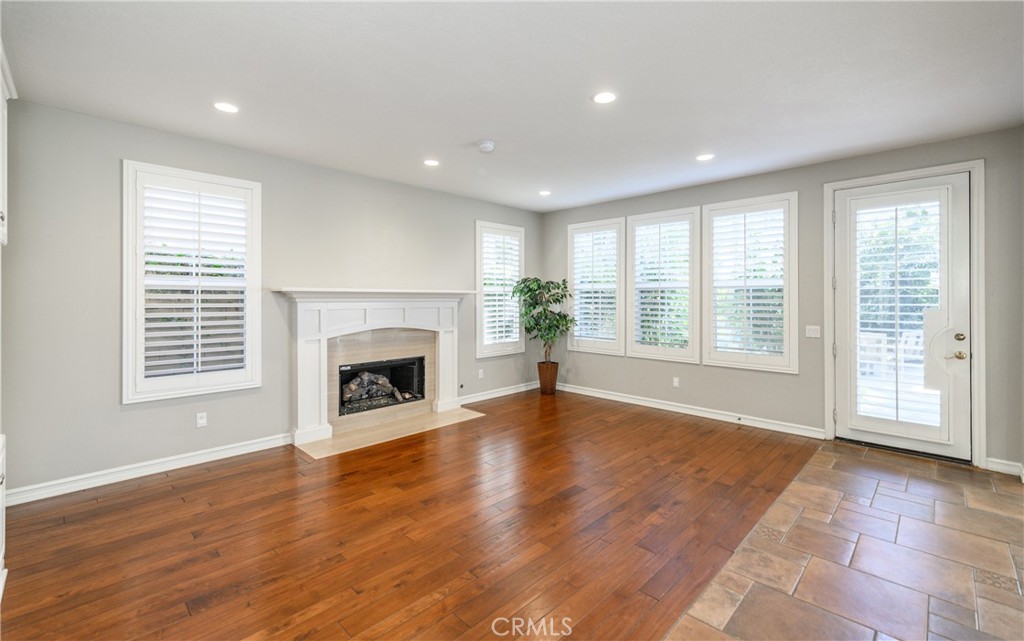 2 Bayleaf Lane Irvine, CA 92620 - Photo 15 of 40 a view of an empty room with wooden floor and a window