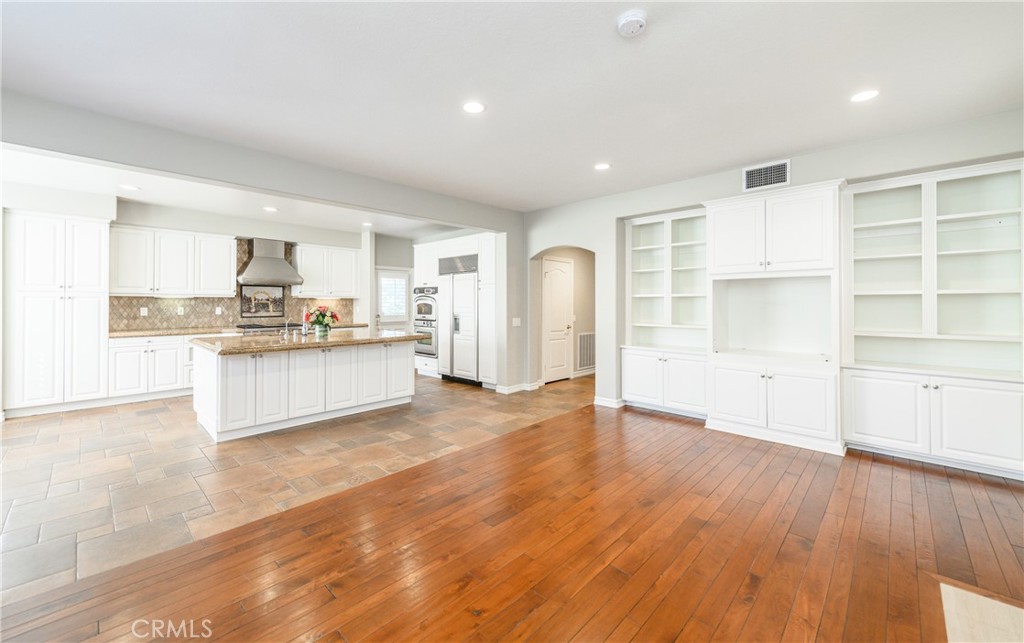 2 Bayleaf Lane Irvine, CA 92620 - Photo 17 of 40 a view of a kitchen with wooden floor