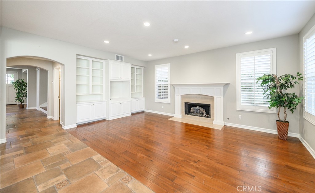 2 Bayleaf Lane Irvine, CA 92620 - Photo 21 of 40 a view of an empty room with a window and fireplace