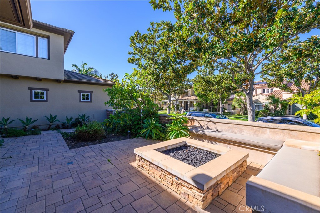 2 Bayleaf Lane Irvine, CA 92620 - Photo 39 of 40 a view of a backyard with plants and a garden