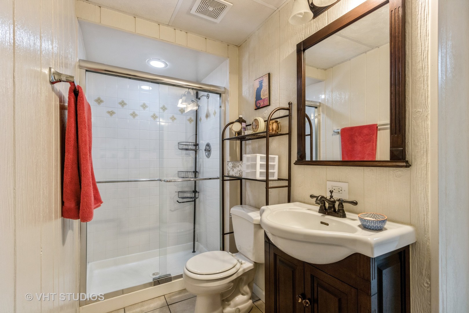 70 Cedar Ridge, Unit C Lake Barrington, IL 60010 - Photo 12 of 18 a bathroom with a sink toilet and shower