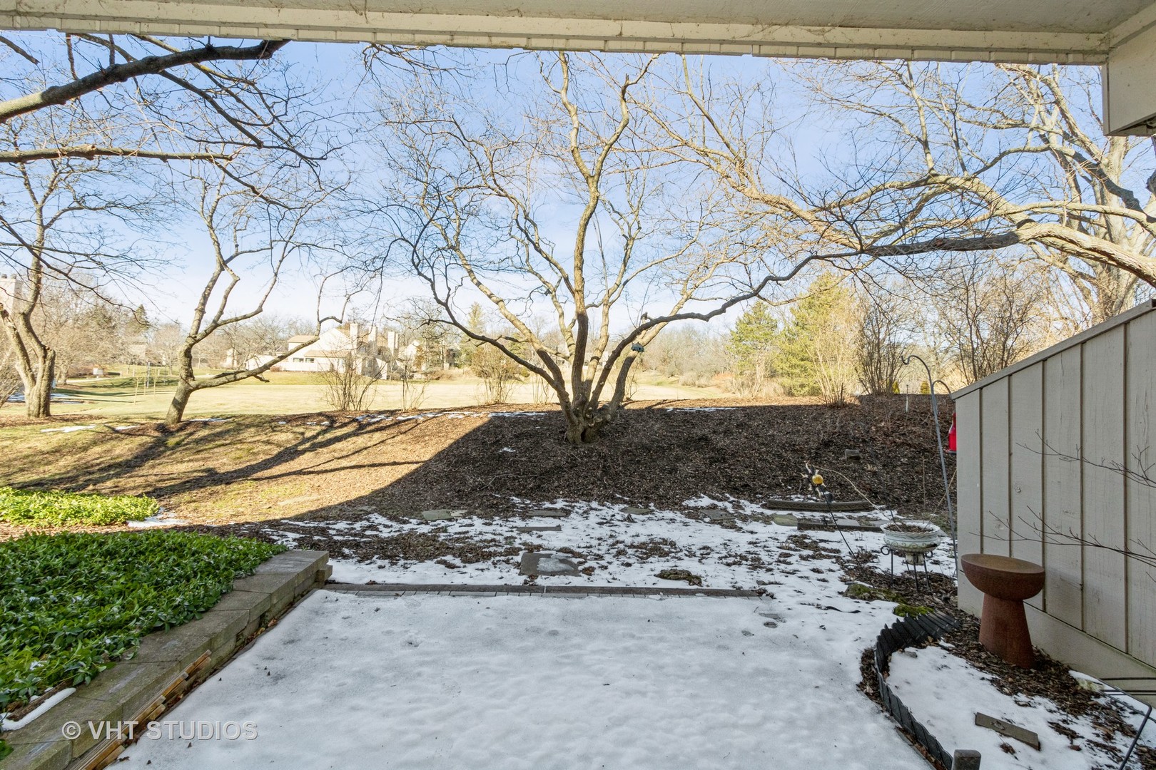 70 Cedar Ridge, Unit C Lake Barrington, IL 60010 - Photo 14 of 18 a view of a backyard of the house