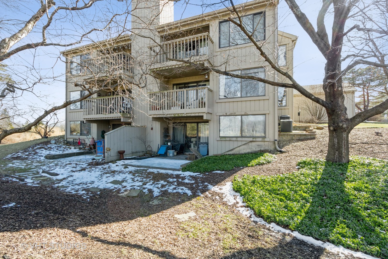70 Cedar Ridge, Unit C Lake Barrington, IL 60010 - Photo 15 of 18 a view of a house with a yard