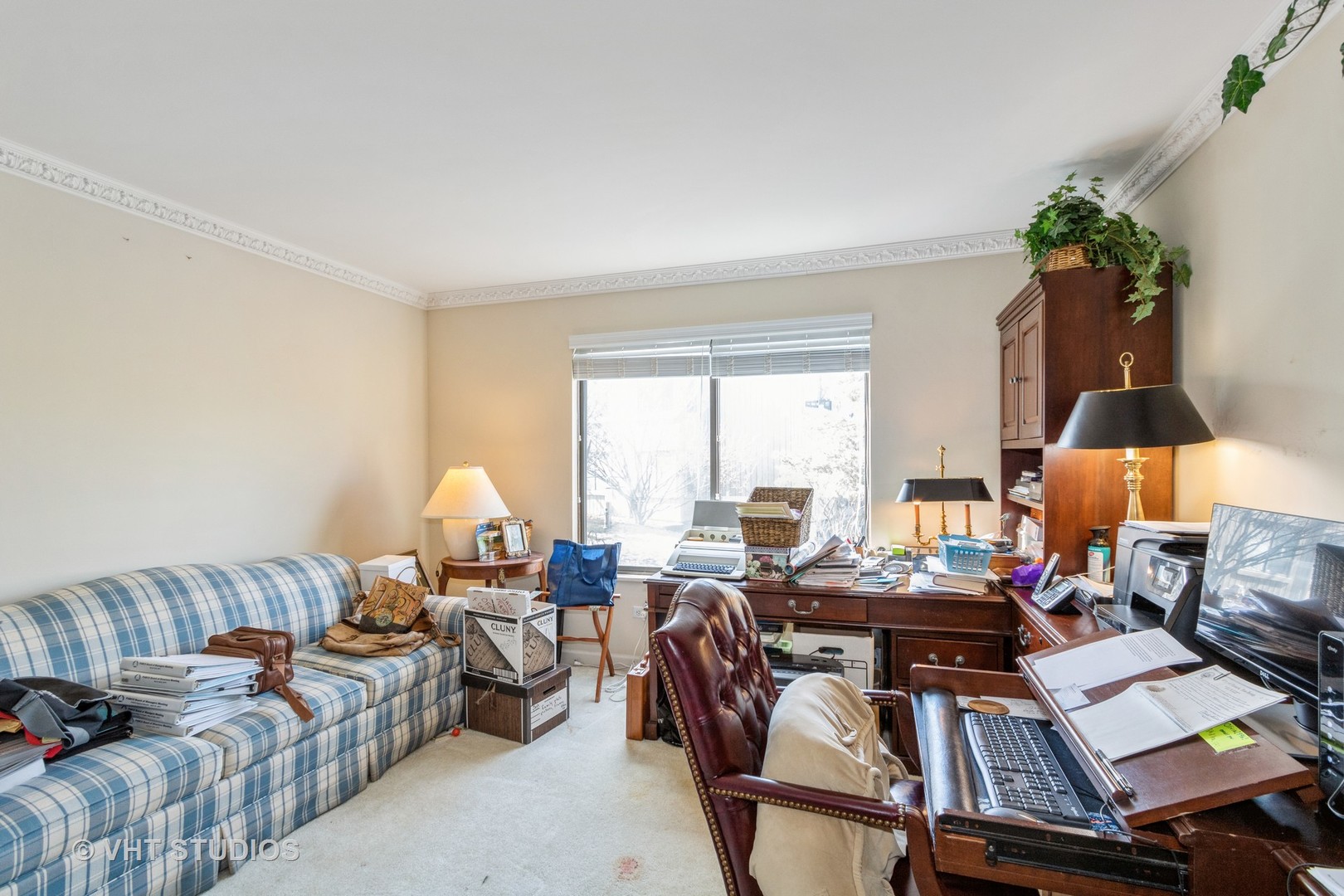 70 Cedar Ridge, Unit C Lake Barrington, IL 60010 - Photo 8 of 18 a living room with furniture and a large window