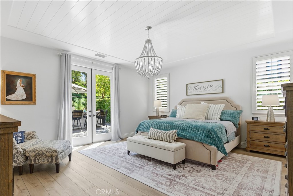 12 David Street Ladera Ranch, CA 92694 - Photo 7 of 30 Main Level Primary Bedroom with French doors leading to backyard!