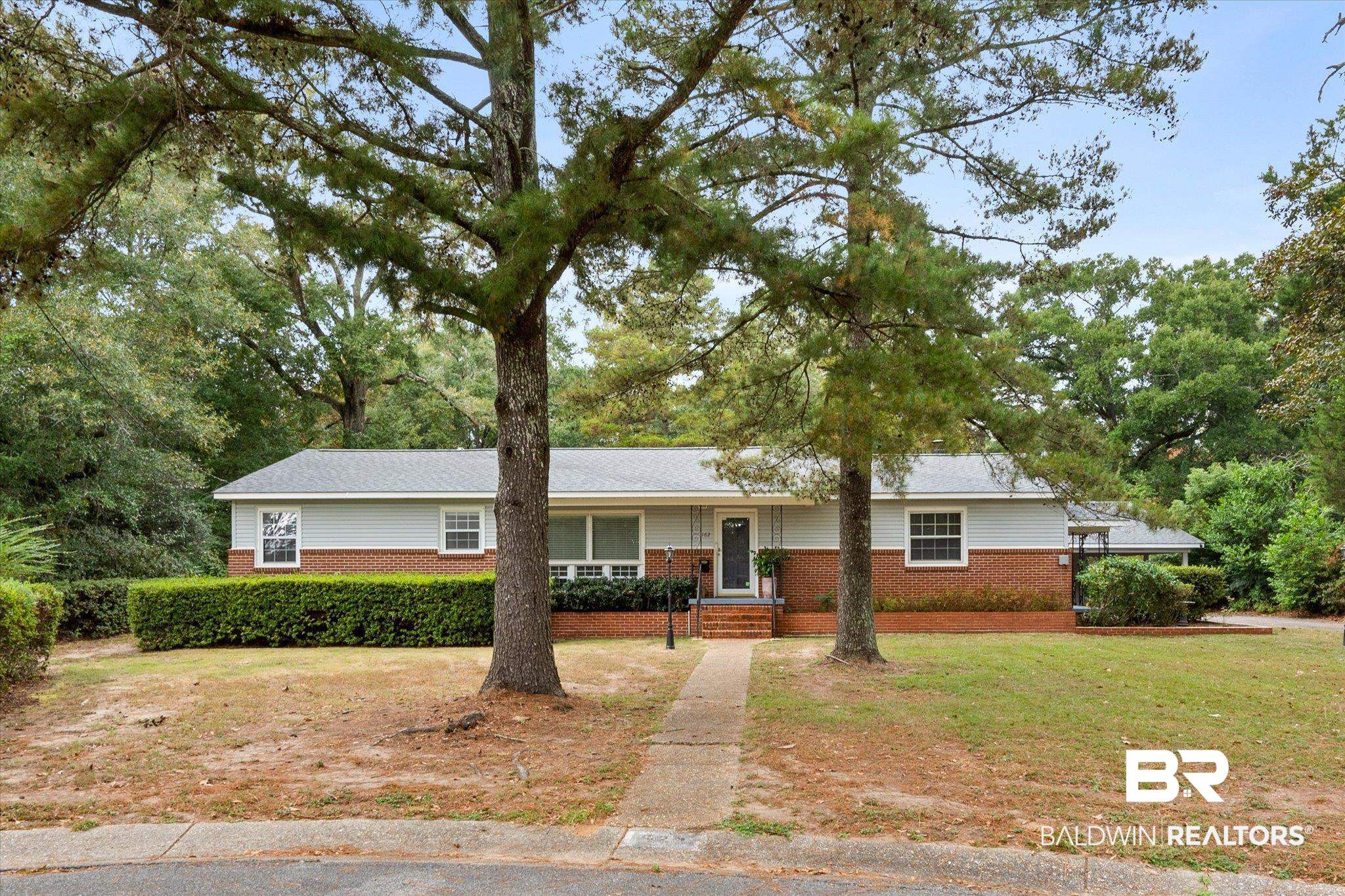162 Bit And Spur Terrace Mobile, AL 36608 - Photo 1 of 29 Ranch-style house with a front lawn
