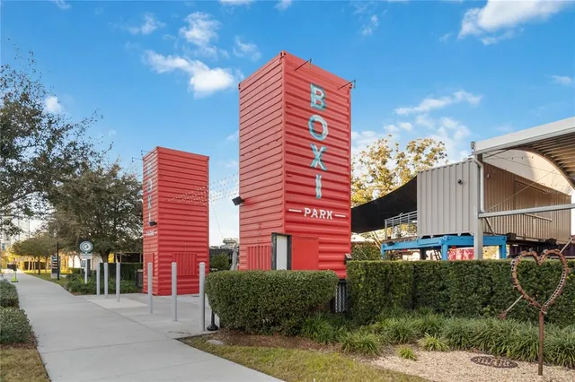 a front view of a building with garden