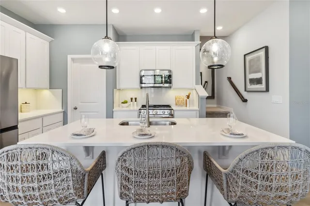 a view of a dining room with furniture