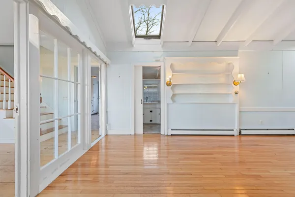 a kitchen with cabinets and a sink