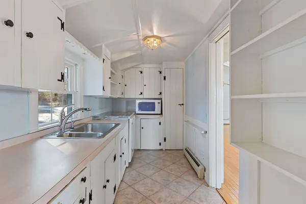 a kitchen with stainless steel appliances granite countertop a stove and a refrigerator