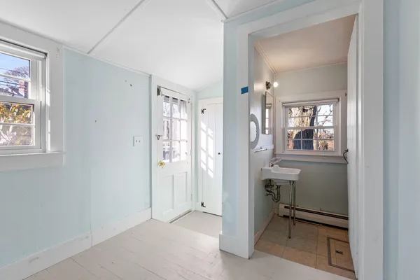 an empty room with windows