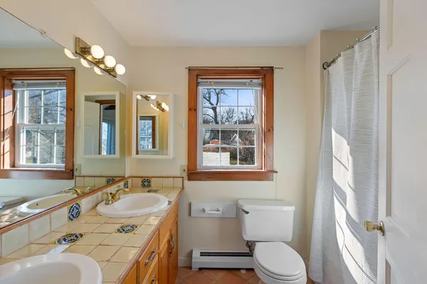 a bathroom with a sink and shower