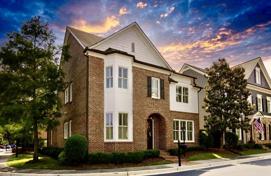 415 Kendemere Pointe Roswell, GA 30075 - Photo 1 of 1 a front view of a house with a yard