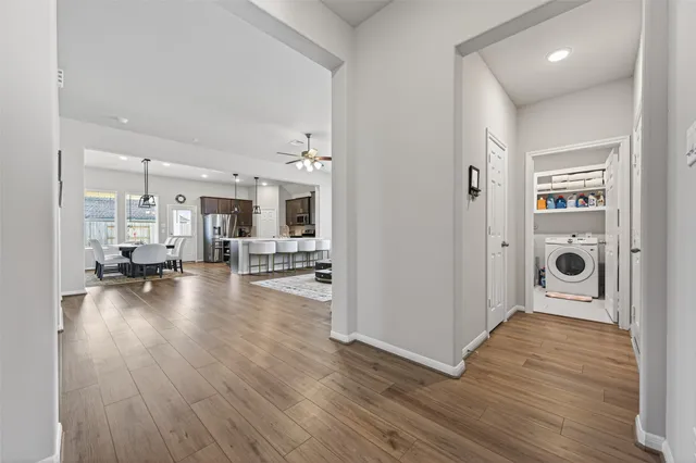 a bedroom with a bed and a chair