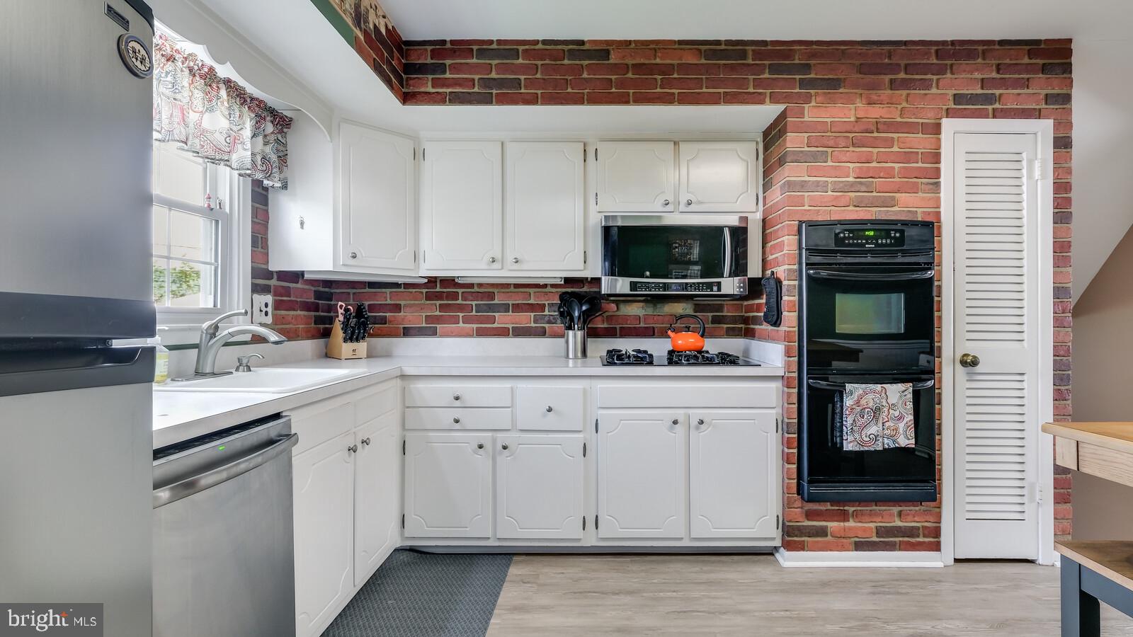 13045 Sewell Road Philadelphia, PA 19116 - Photo 13 of 40 White kitchen
