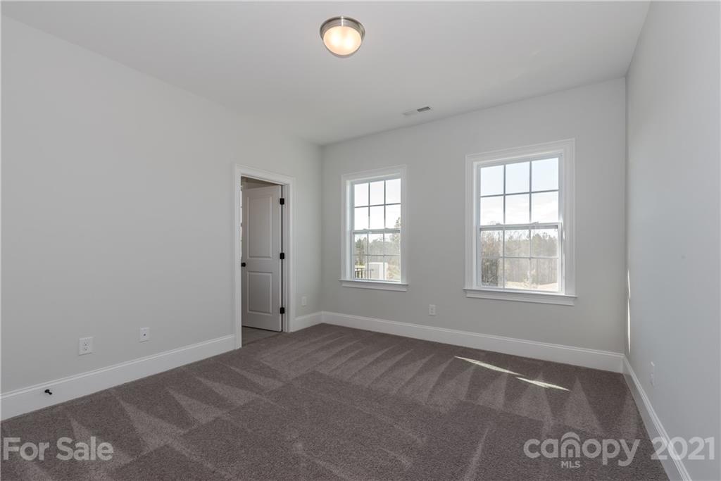 4006 Oarman Court, Unit 440 Fort Mill, SC 29708 - Photo 11 of 15 an empty room with windows