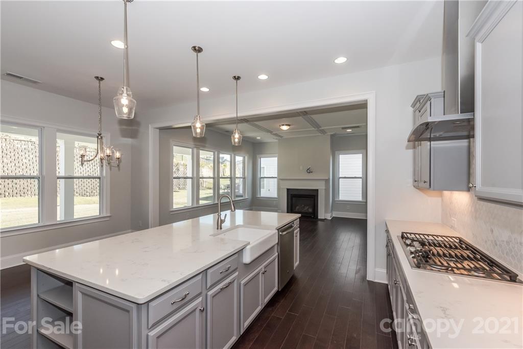 4006 Oarman Court, Unit 440 Fort Mill, SC 29708 - Photo 6 of 15 a large white kitchen with a large window