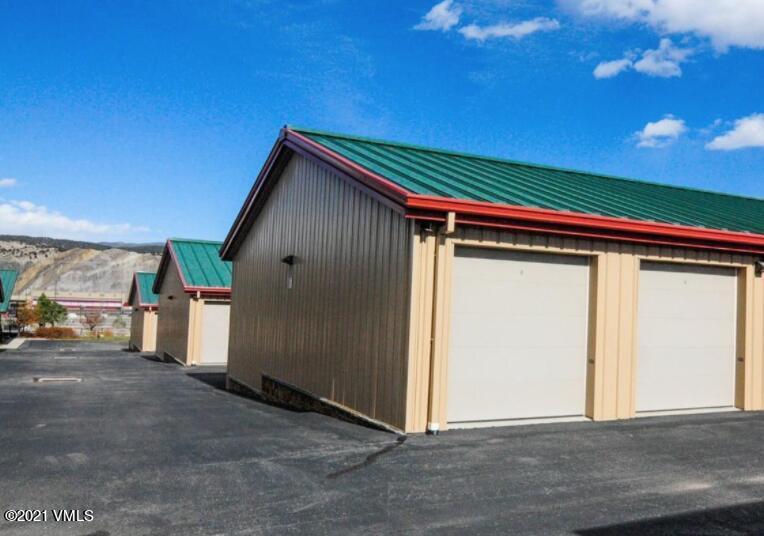 55 Spring Creek Road, Unit 159 Gypsum, CO 81637 - Photo 3 of 4 a backyard of a house