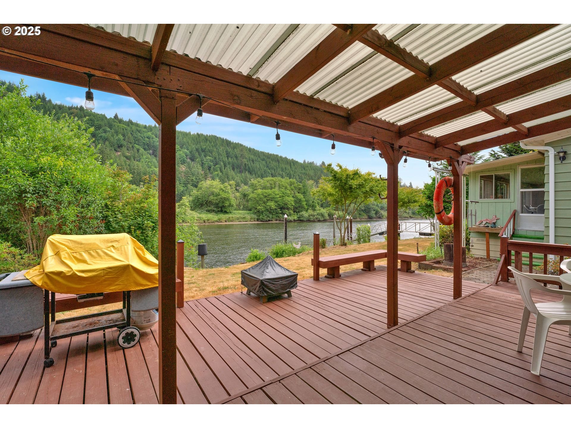 10273 Sweet Creek Road Mapleton, OR 97453 - Photo 24 of 48 a view of sitting area with furniture and wooden floor
