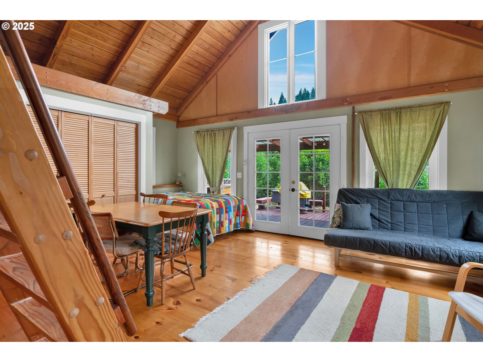10273 Sweet Creek Road Mapleton, OR 97453 - Photo 29 of 48 a living room with furniture and a wooden floor