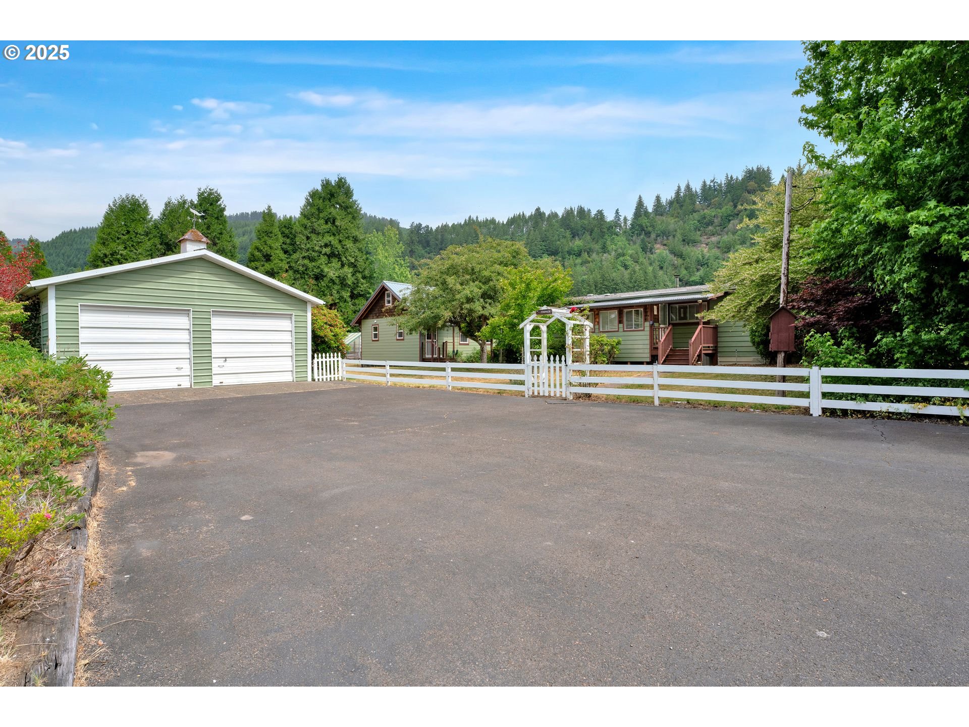 10273 Sweet Creek Road Mapleton, OR 97453 - Photo 42 of 48 a house view with a outdoor space
