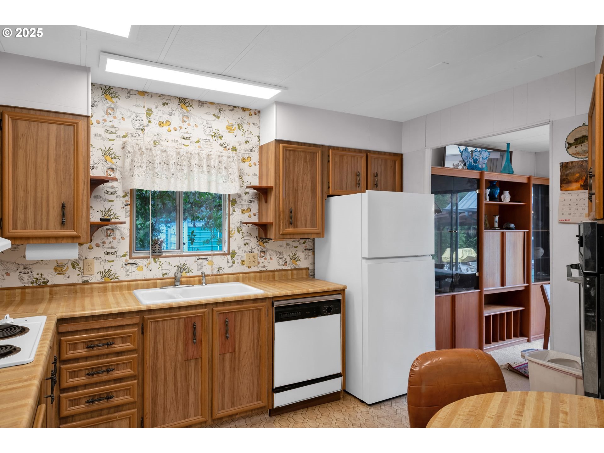 10273 Sweet Creek Road Mapleton, OR 97453 - Photo 8 of 48 a kitchen with stainless steel appliances granite countertop a refrigerator sink and cabinets