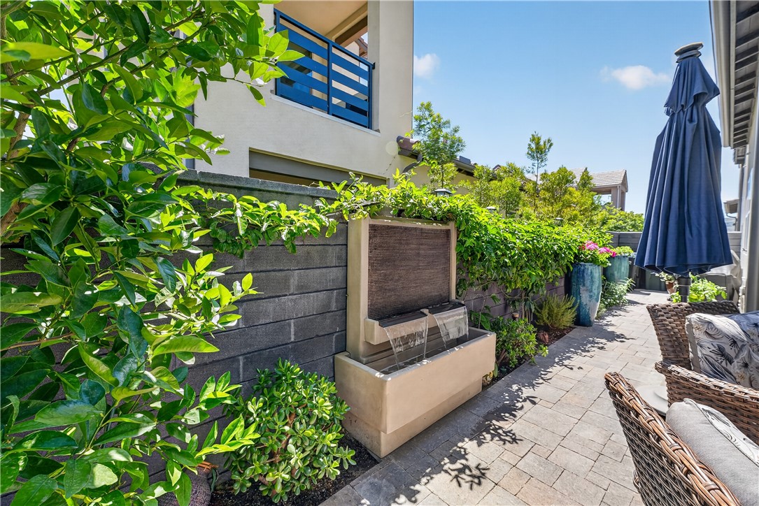 752 Sunrise Road Rancho Mission Viejo, CA 92694 - Photo 17 of 73 a view of a garden with chair and potted plants